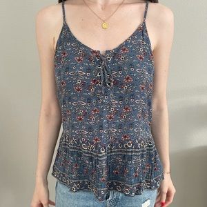 Flouncy floral lace up tank